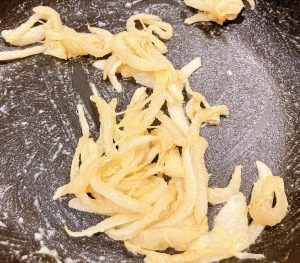 Roux with onions evenly coated and cooked