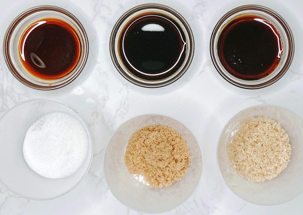 Teriyaki sauces made with white sugar, brown sugar, and raw sugar showing differences in glaze thickness and color