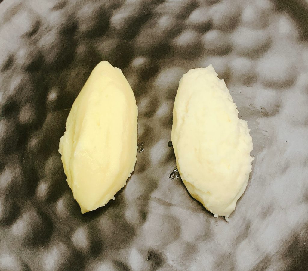 Side-by-side comparison of restaurant-style mashed potatoes and home-style mashed potatoes.