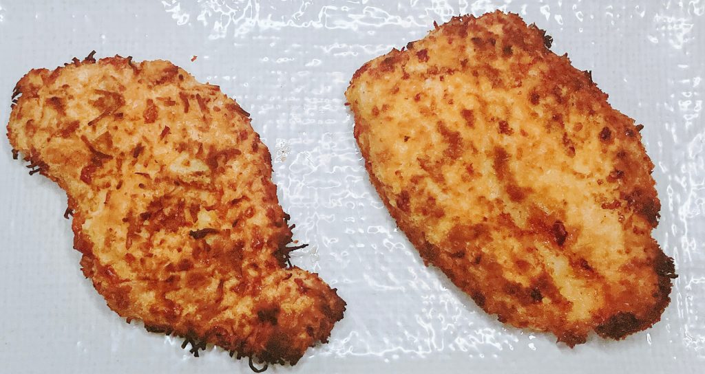 Cooked chicken katsu cutlets comparison with keto crumb on the left and panko crumb on the right.