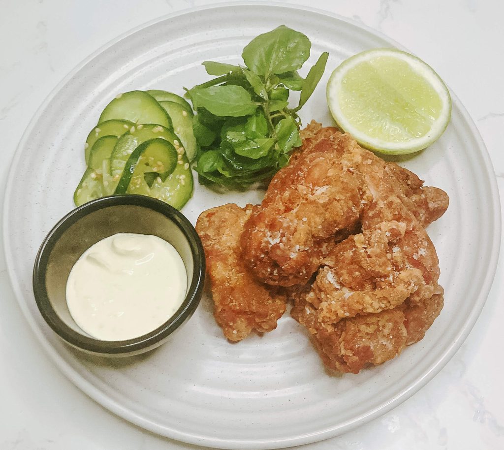 Crispy karaage chicken with quick cucumber pickles and wasabi sour cream dipping sauce
