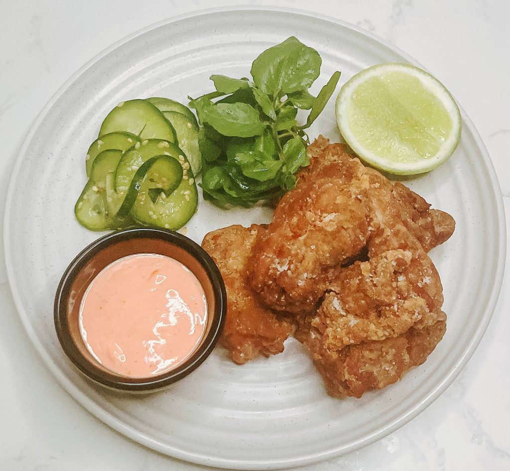 Air fryer karaage chicken with sambal chili mayo dipping sauce and cucumber pickles