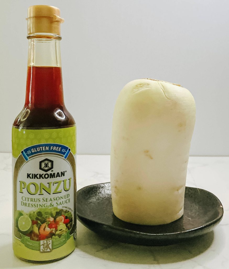 Ponzu sauce and grated daikon radish – ingredients for oroshi ponzu dipping sauce to serve with karaage chicken.