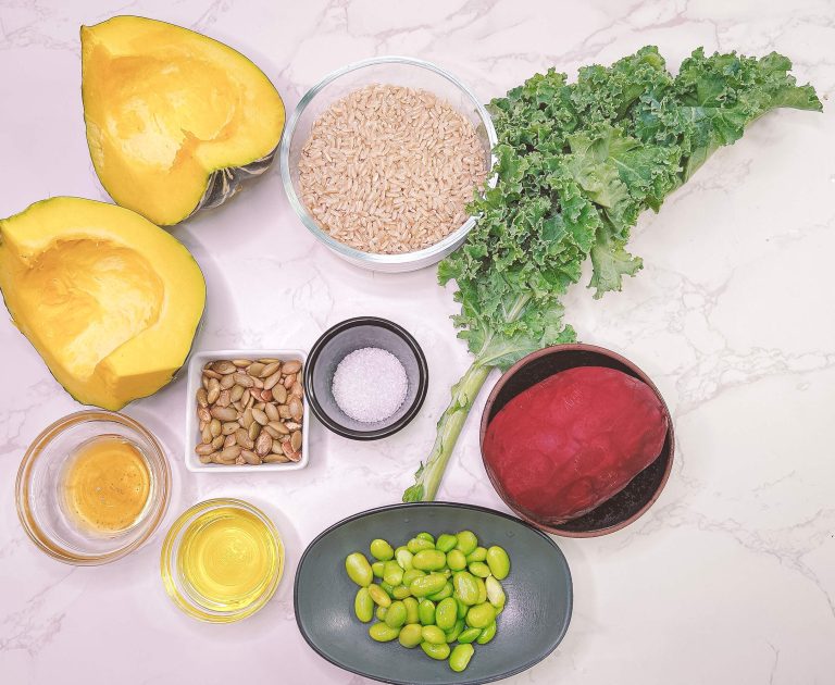 ingredients for brown rice salad with roasted pumpkin kale beetroot edamame and sesame seeds
