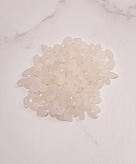 Raw short grain white rice before cooking