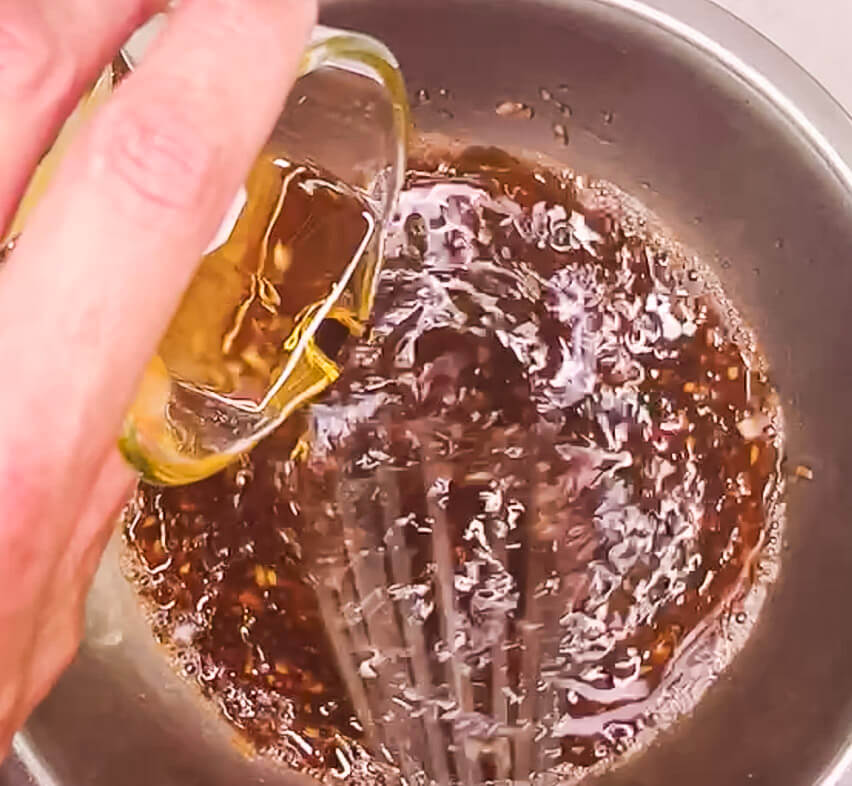 Whisking oil into Japanese onion dressing for brown rice salad