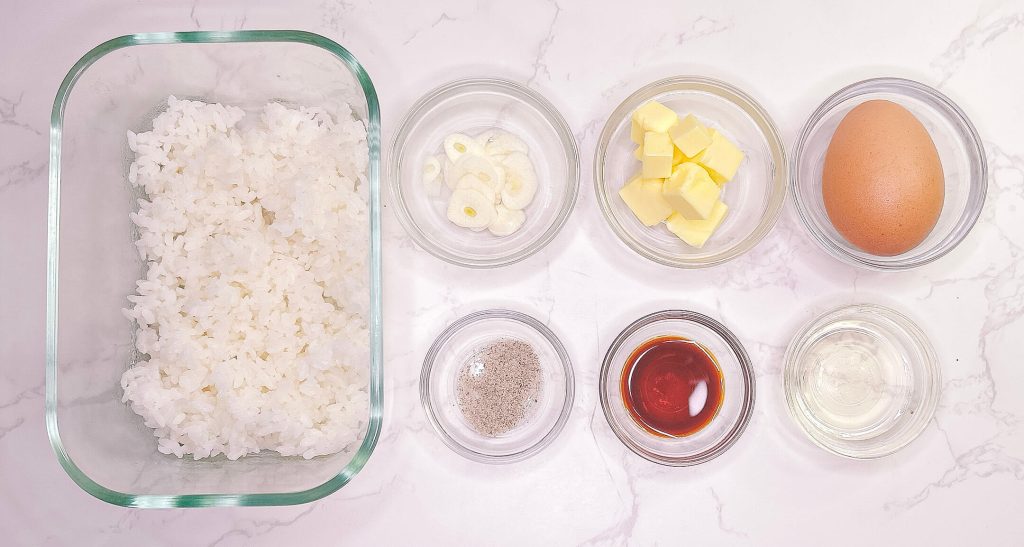 Garlic butter fried rice ingredients including rice, garlic, butter, egg and soy sauce